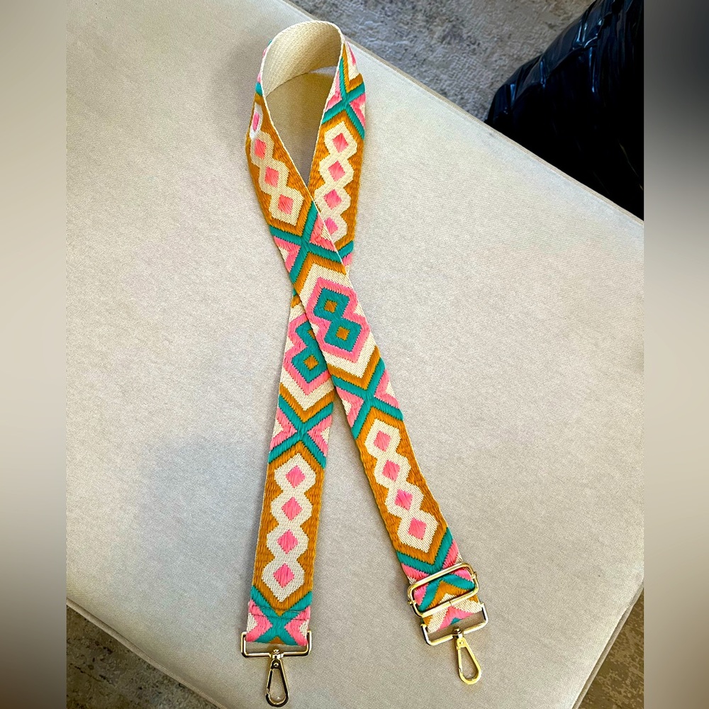 Crossbody purse strap with gold hardware.  Never used.